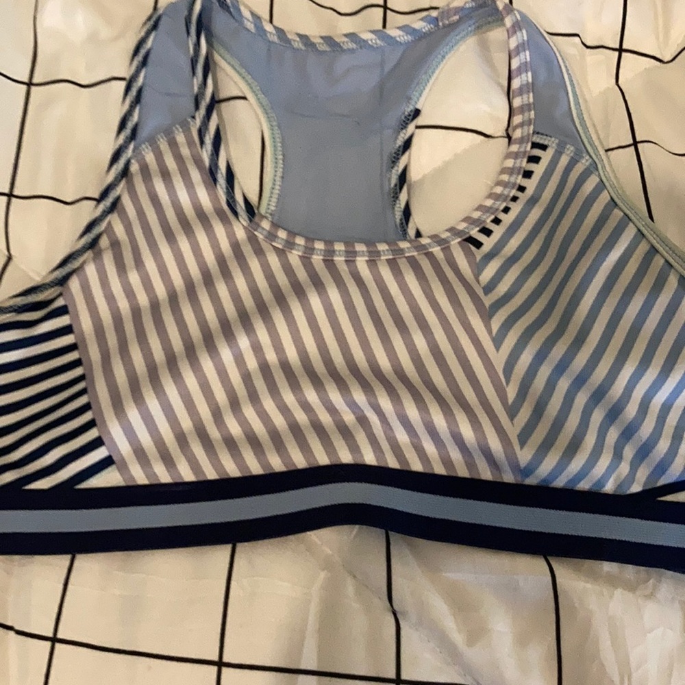 Light blue dark blue and white sports bra